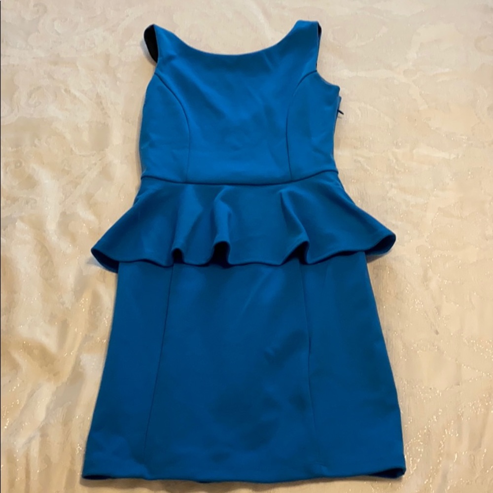 Blue peplum stretch knit dress